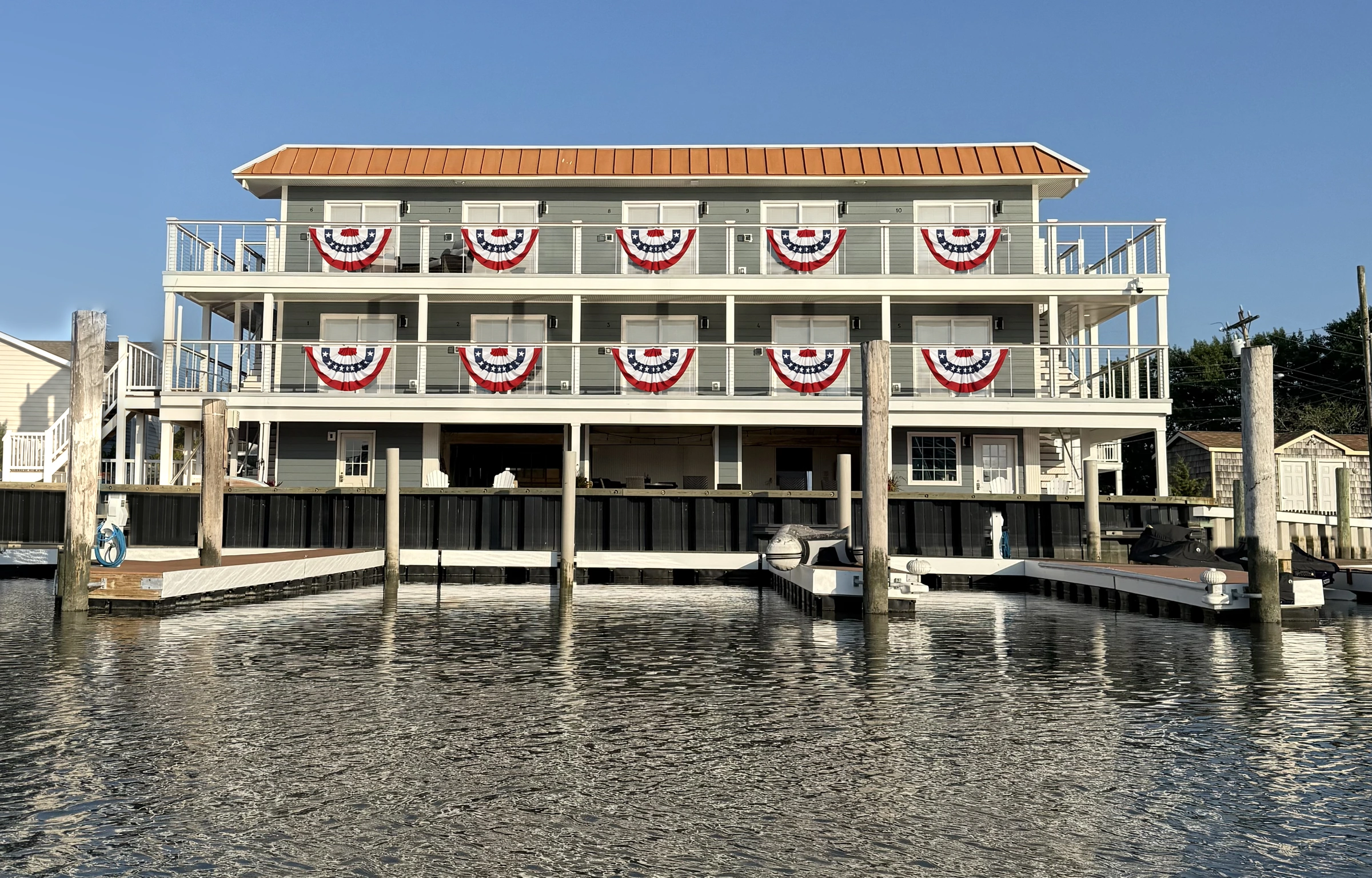 The real Yacht Avenue Condos building and docks, viewed from Cape May harbor