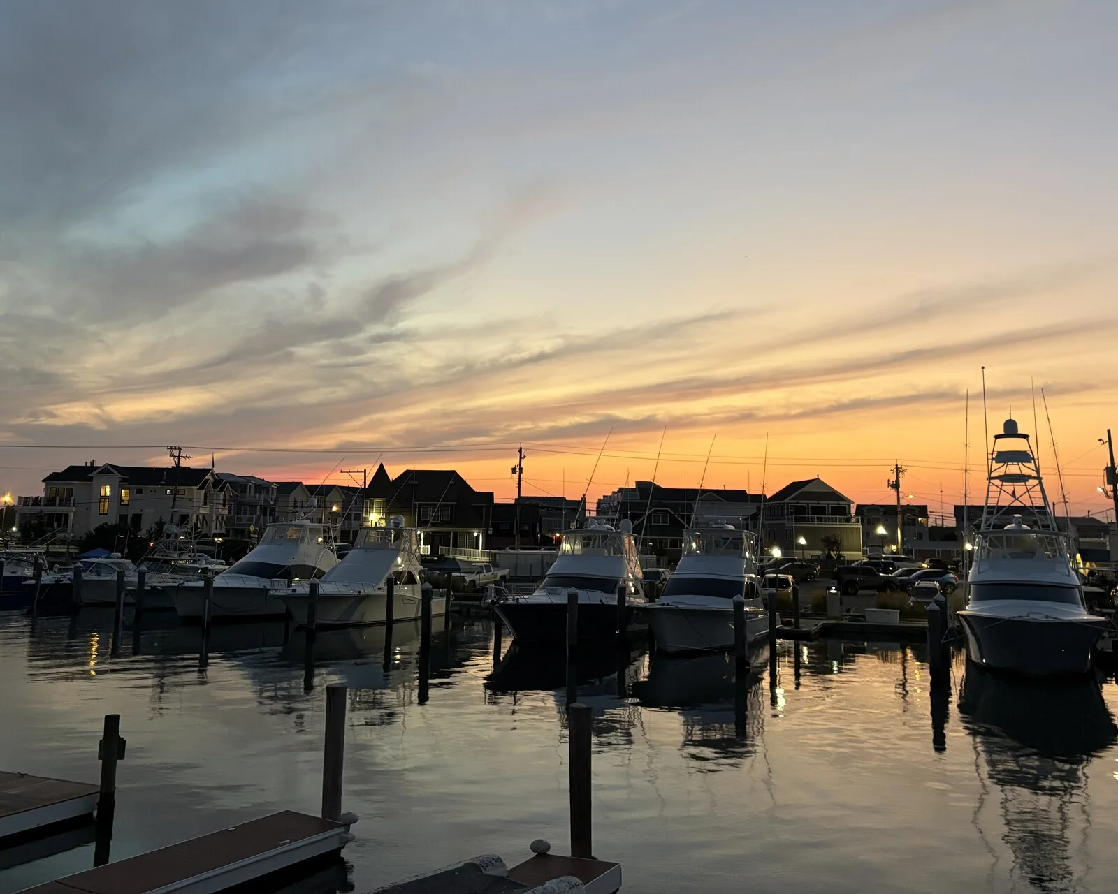 John's original sunset photograph showing boats reflected in Cape May harbor